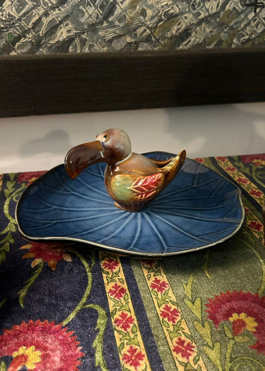 Toucan on Lotus Plate